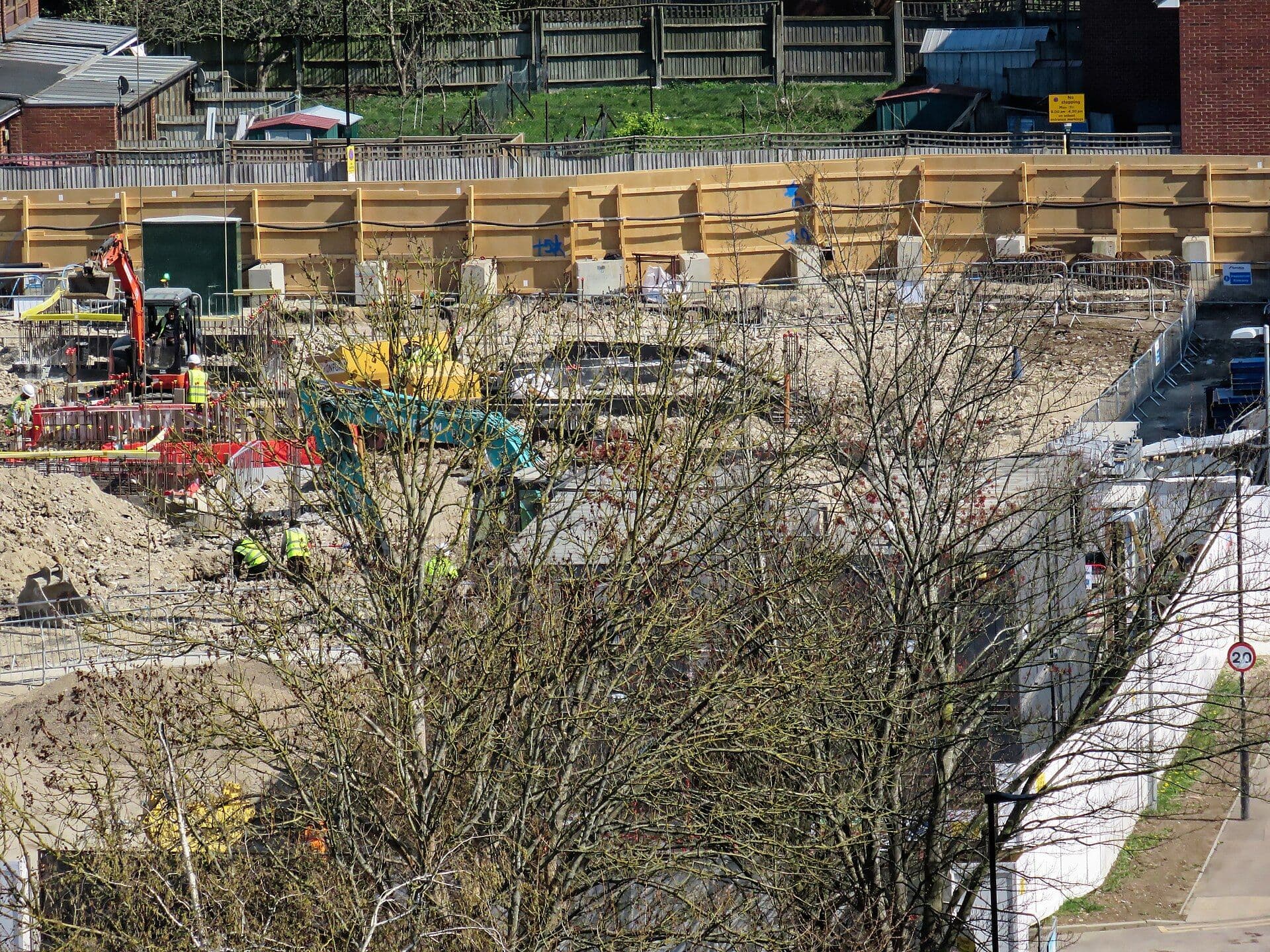 Tradespeople at work on a building site